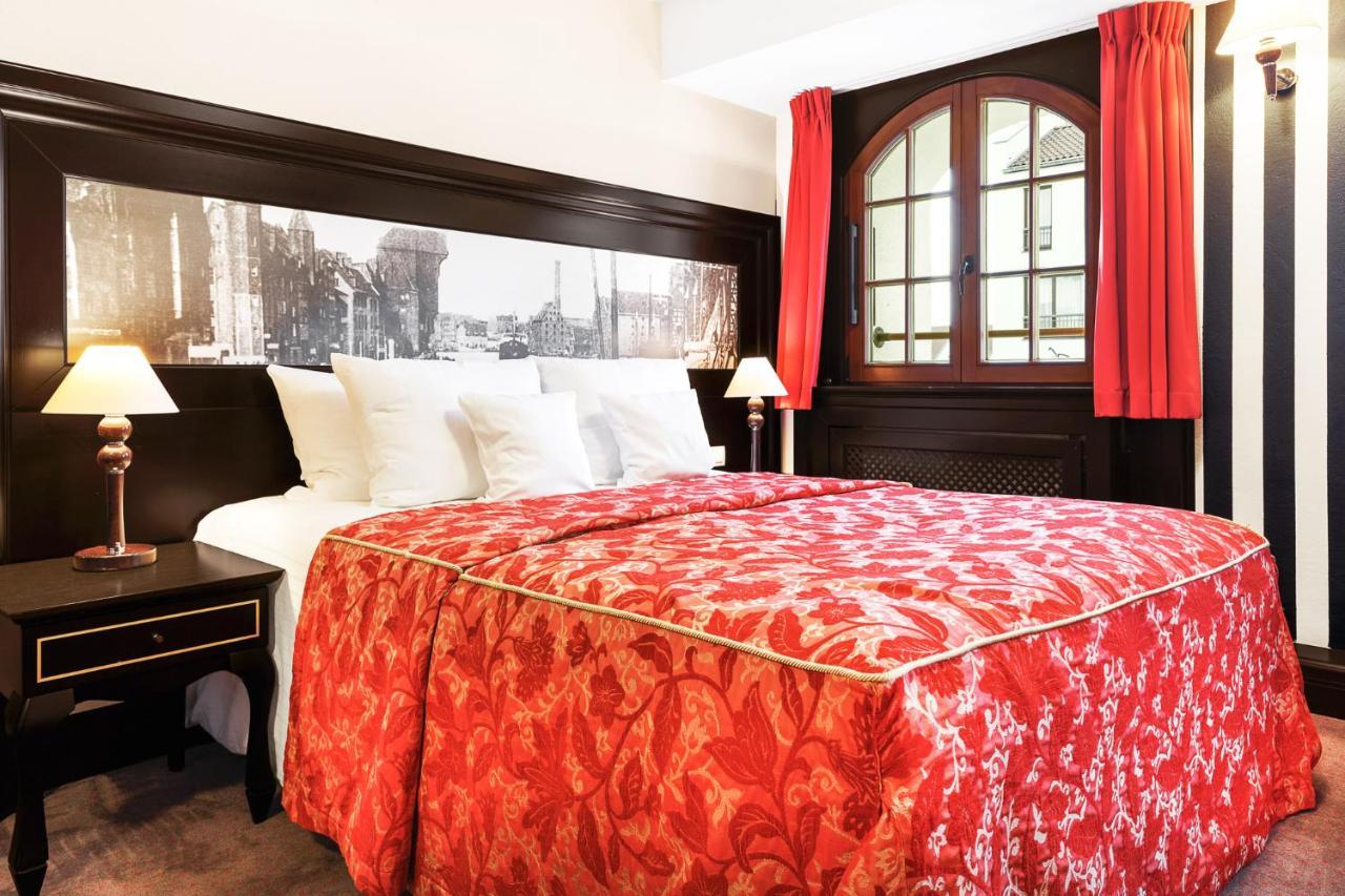 Hotel Gdansk Boutique Bagian luar foto A typical room at the hotel